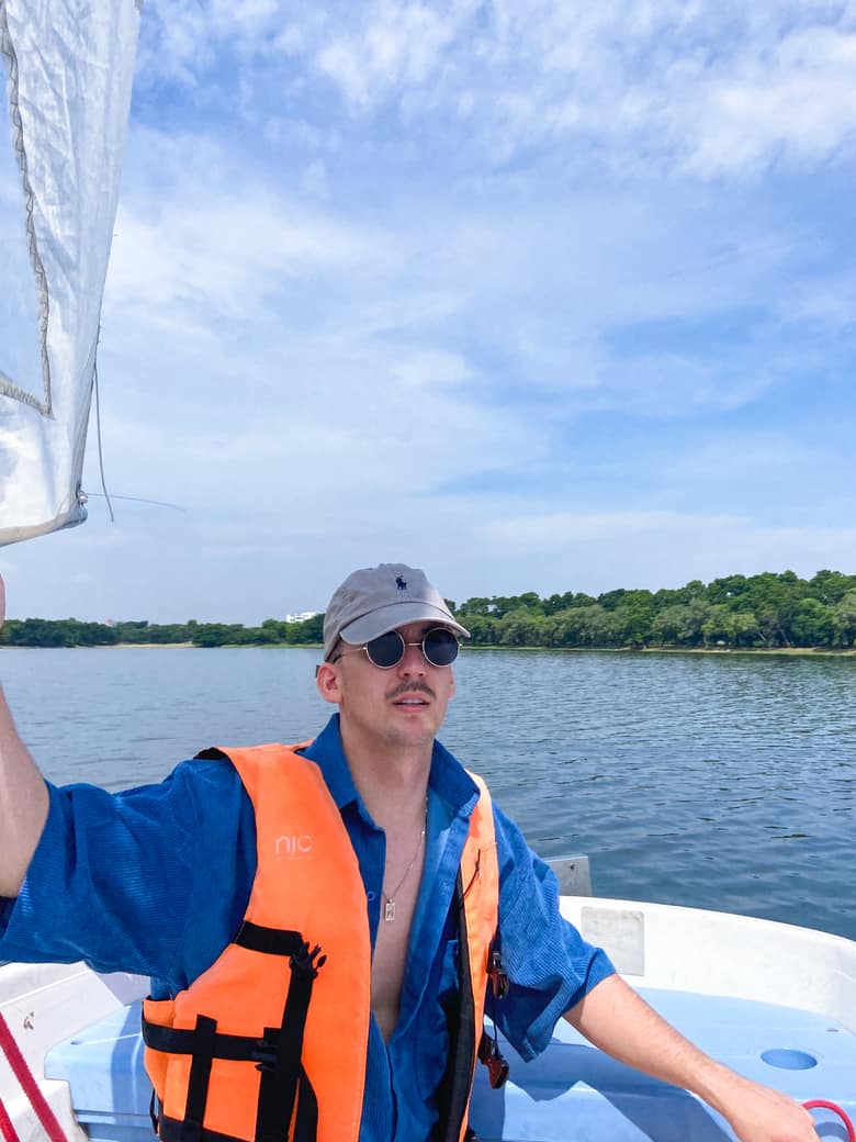 Sailing a small dinghy across Nong Bon lake in Bangkok